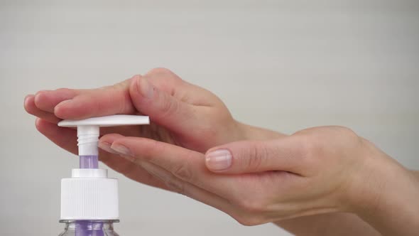 A Woman Picks Up Soap in Her Hands To Clear the Skin of Bacteria, Dirt and Viruses. Concept of Hand alt