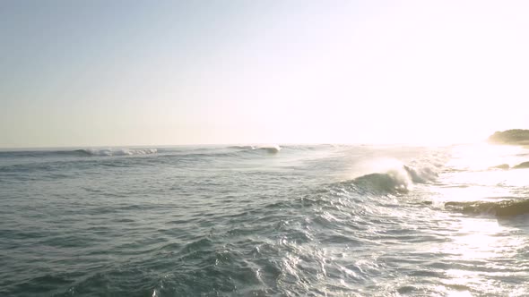 Rolling Waves Sunset beach coastal Drone View alt