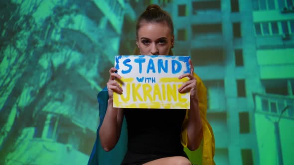 Front View Sad Desperate Ukrainian Woman Showing Stand with Ukraine Placard Looking at Camera alt
