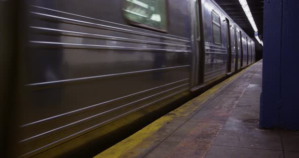 Subway Train Leaving at Platform in Manhattan New York 07B