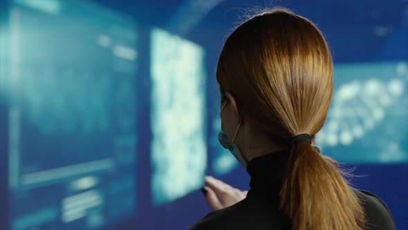 Female Portrait of Biotechnologist Checking New Data in the Laboratory alt