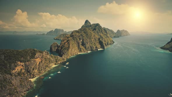 Sun Light Over Serene Seascape at Tropical Philippines Island of Aerial View alt
