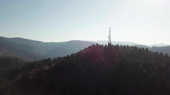 Mobile communication tower in the mountains. alt