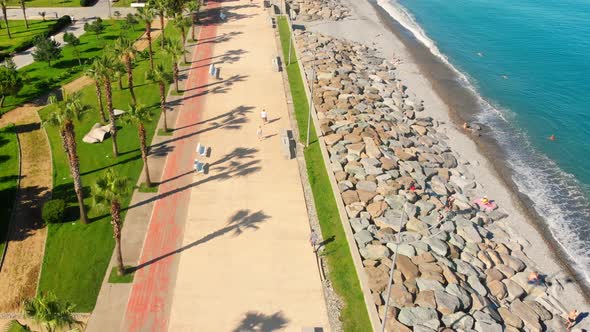 People Walk On Batumi Coast