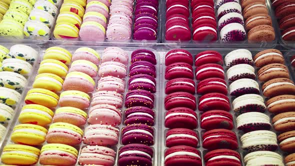 Different Color Cakes Macaroons on the Counter Confectionery