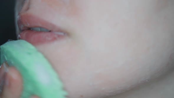 Woman is washing cleaning face alt