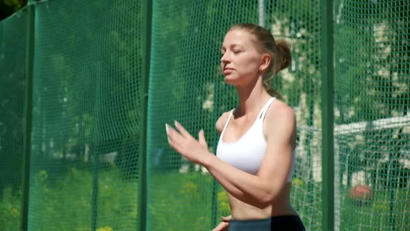 Caucasian Sportive Blond Busty Pretty Female Spot Running Sprinting in Place alt