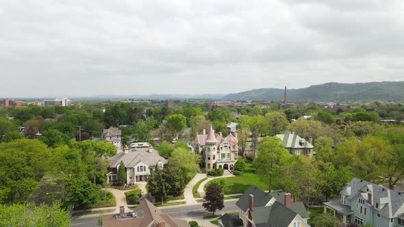 Aerial view of well established residential neighborhood of historic homes in Wisconsin in autumn.