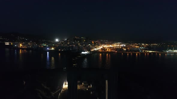 Naxos island marina in the Cyclades in Greece aerial night view alt