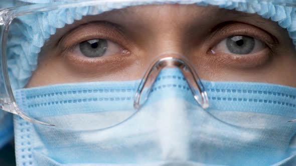 Woman Doctor Face, Eyes in Safety Glasses. Portrait Medical Female Wearing Protection and Eyeglasses