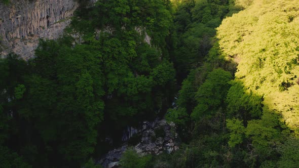 Touristic Landmark in Georgia  Beautiful Okatse Canyon and Its Small Cascade Birdseye View alt