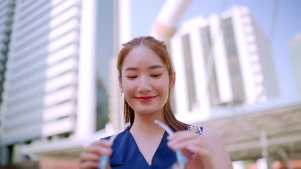 Office Girl in the city (Bangkok), wearing face shield