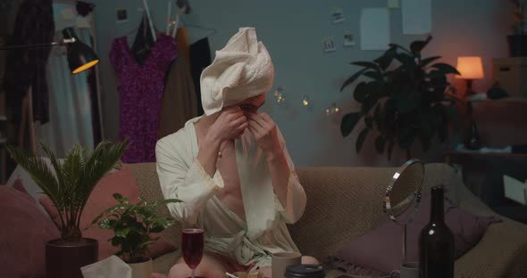 Transgender Man in Satin Robe Putting Patch Under Eye and Singing, Relaxed Young Transgender alt