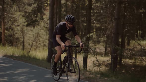 Cyclist Fitness Riding On Road Bike Training Triathlon Race. Recreation Sport. Hard Sport Workout. alt