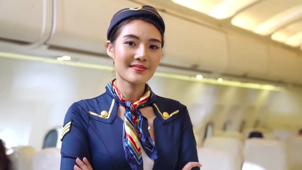 Cabin Crew or Air Hostess Working in Airplane alt