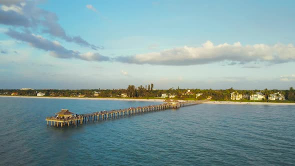 View From the Ocean To the Pier with Tourists alt