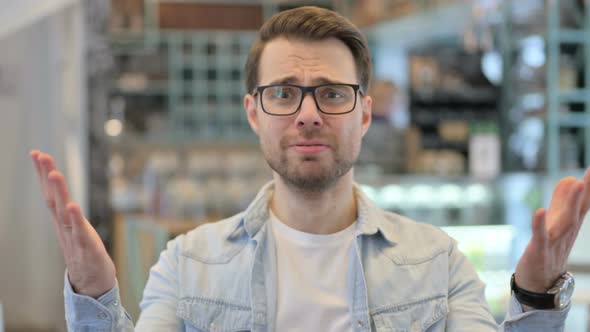 Disappointed Man Reacting Loss alt