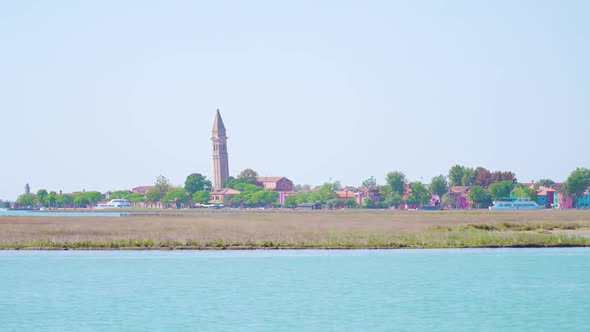 Burano Church Bell Tower View From Boat on Venitian Lagoon alt