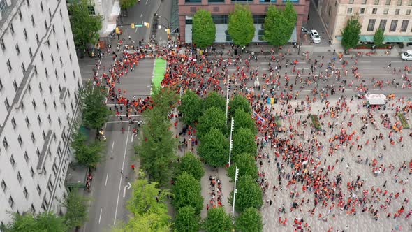 Protesters Gather in the Streets of Vancouver to Cancel Canada Day, Drone overhead viewing forward i alt