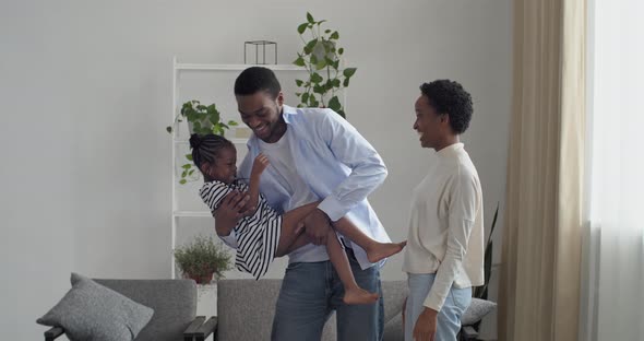 Afro American Family of Three People Spend Time Together at Home alt