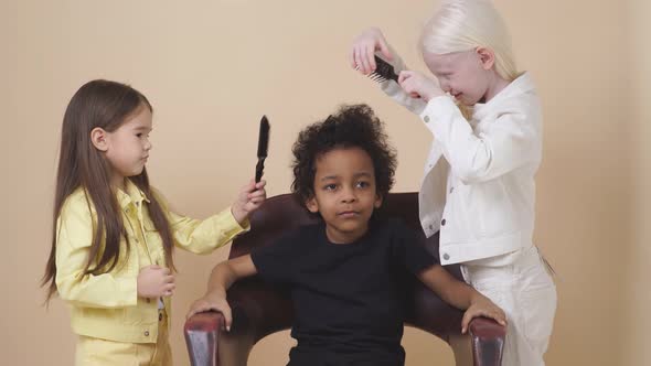 Friendly Diverse Kids Play Hairdressers. alt
