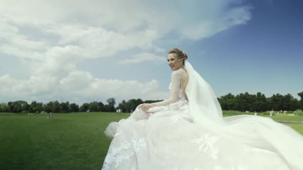 Bride is Running on the Green Field