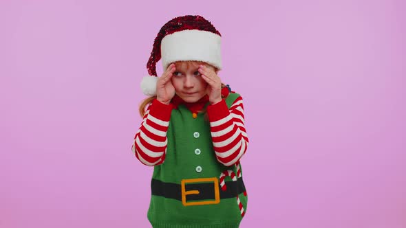 Girl Kid Toddler Santa Christmas Elf Fooling Around Having Closing Eyes with Hand and Spying Through alt