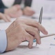 Boss Listening To Presentation Of Project At Conference, Pen Tapping On Table - VideoHive Item for Sale