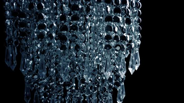 Moving Past Chandelier On Black alt