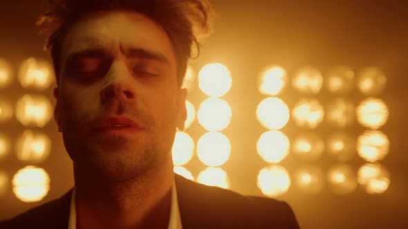 Professional Model Posing Camera in Studio with Club Spotlights alt