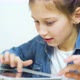 Little Girl in Jeans Wear Playing Online Games on Tablet - VideoHive Item for Sale