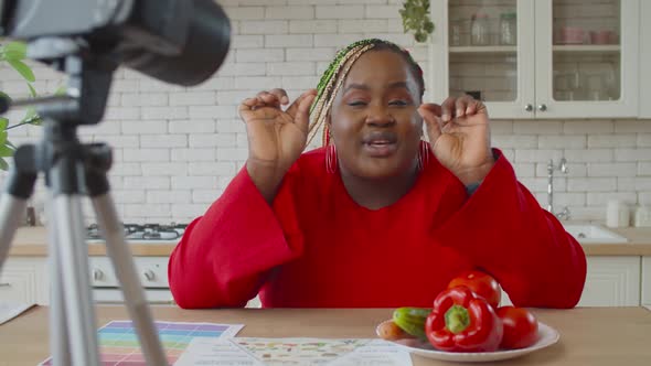 Female Blogger Asking Audience To Subscribe To Vlog alt