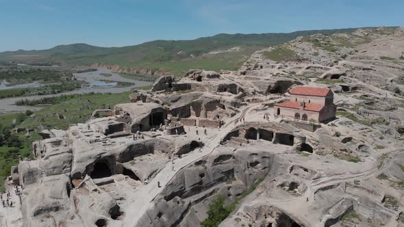 Amazing aerial view of ancient town Uplistsikhe in Georgia. alt