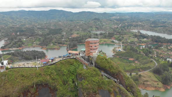 View from the top of the Peñol Stone in Guatape, Antioquia - Tourist site of Colombia - aerial drone alt