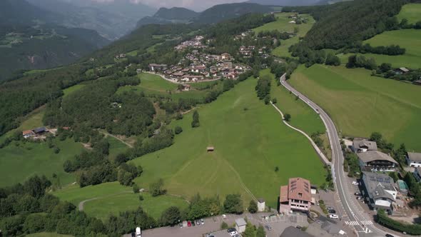 Aerial drone video of the city of Völs am Schlern Fie allo Sciliar  on the Italian Alps Dolomites alt