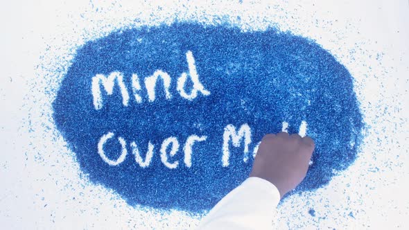 Indian Hand Writes On Blue Mind Over Matter