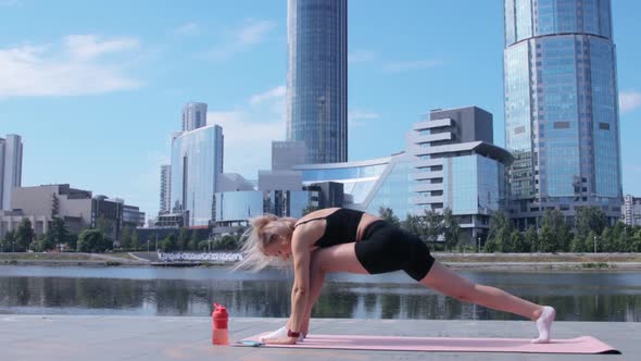 Woman working out in city