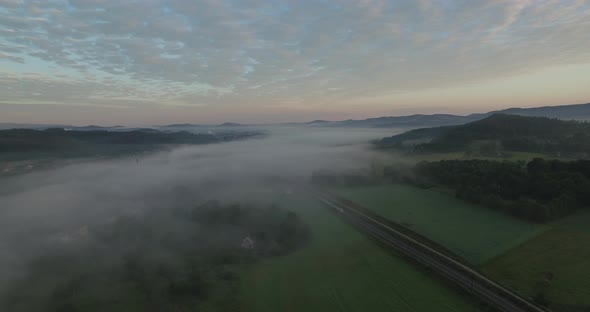 Aerail Over Train In Fog