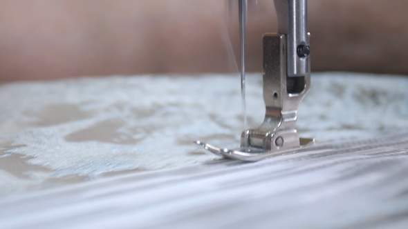 Designer working with sewing machine