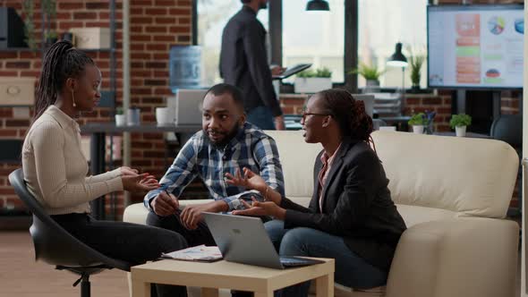 Group of Employees Brainstorming Ideas to Plan Business Strategy alt