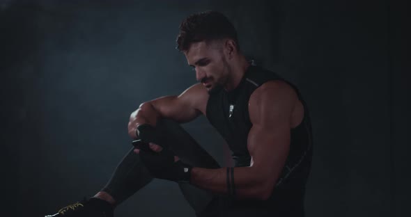 In a Dark Studio Gym Athletic Man Charismatic alt