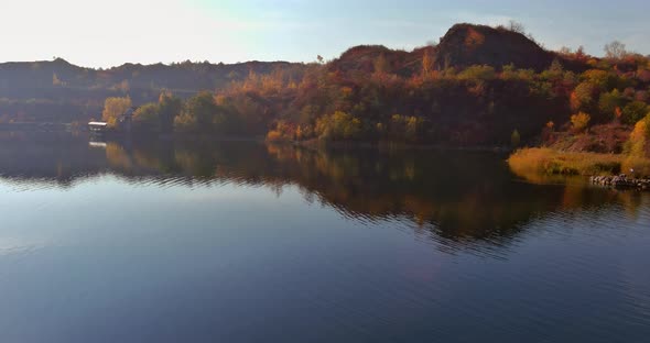 Artificial Lake in a Quarry with Turquoise Background of the Clearwater Autumn Season alt