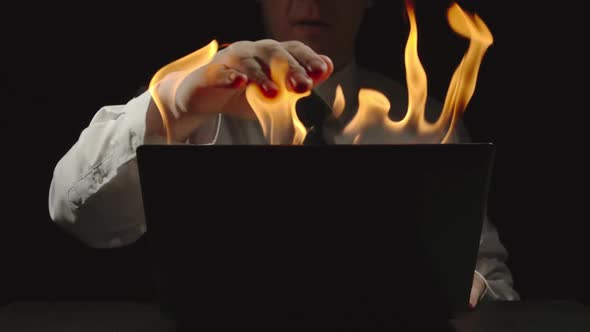 Businessman Is Shutting Burning Laptop And Grabbing His Head