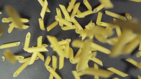 Many Of Noodles Fall On A Black Table
