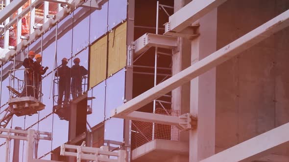 working process at a construction site alt