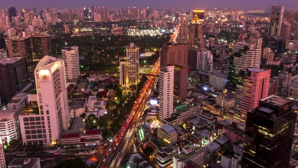 Bangkok business district city center, traffic during rush hour, day to night, zoom in – Time Lapse