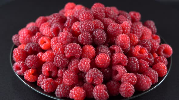 Fresh, ripe, juicy red raspberry background, close up berry, rotation, macro alt