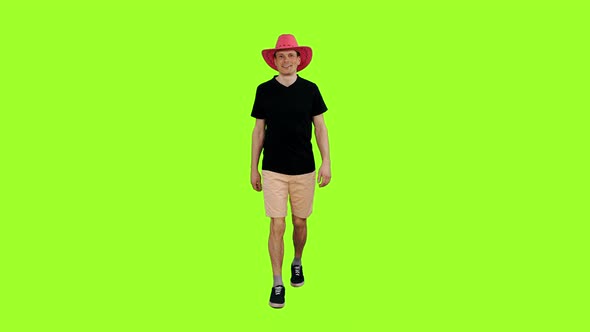 Walking Positive Guy in Black T-shirt and Pink Cowboy Hat
