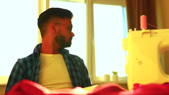 Indian Stylist Sewing All Night Long and Feeling Bad alt