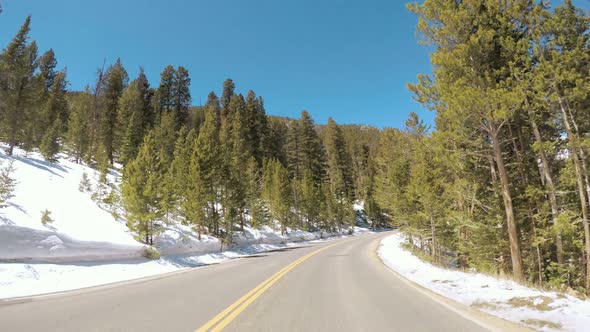 POV point of view -Driving through Rocky Mountain National Park in the Spring. alt